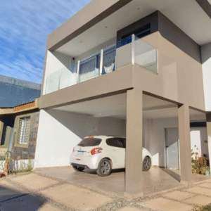 Baranda de balcón en vidrio con parantes de acero inoxidable